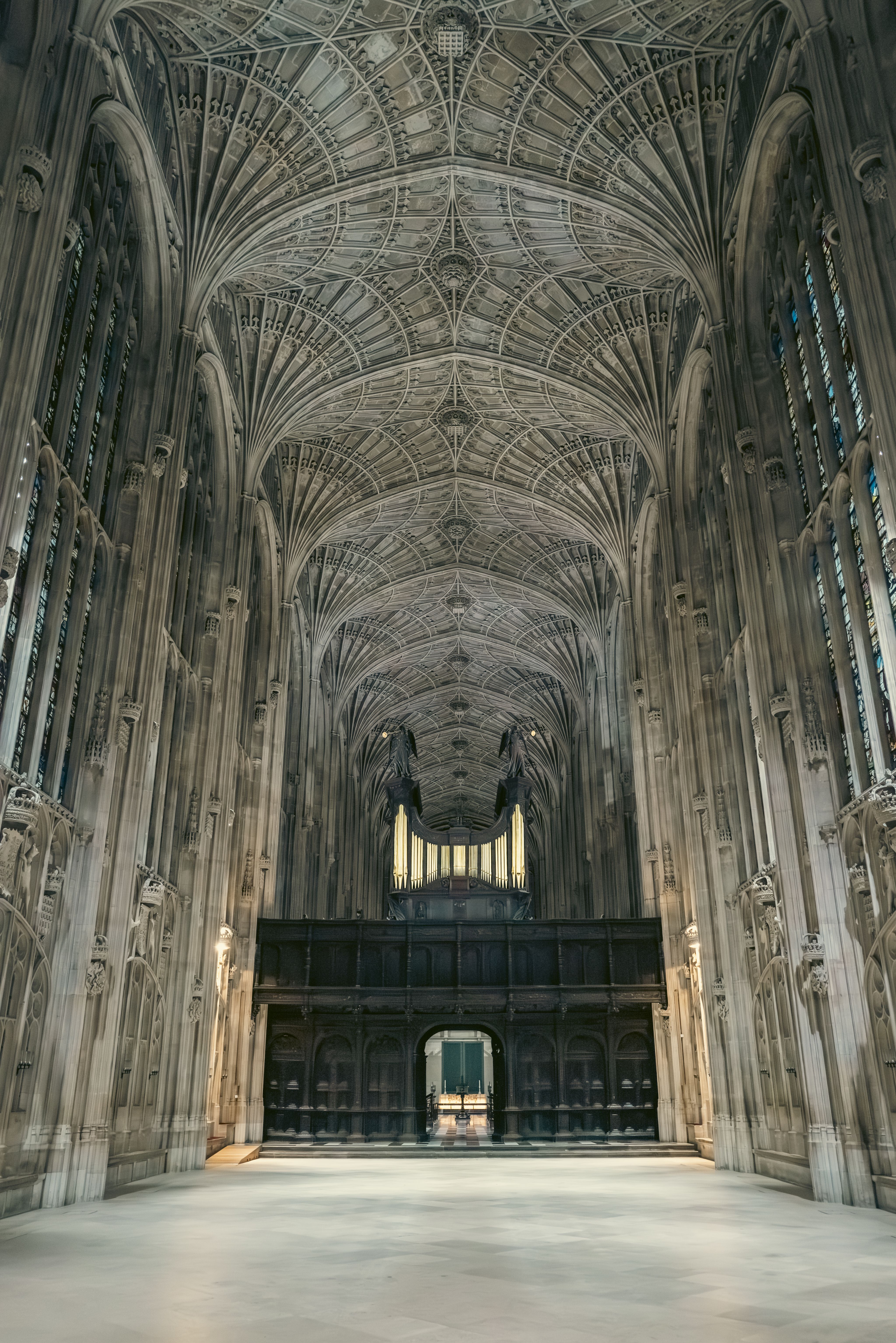 Medieval chapel interior wall and ceiling with stained glass windows